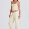 Pantalones de chándal de pierna ancha de punto acanalado en color crema