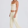 Pantalones de chándal de pierna ancha de punto acanalado en color crema
