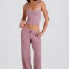 Pantalones de chándal de pierna ancha de punto acanalado en malva