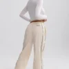 Pantalones de chándal de pierna ancha repelentes al agua en color mármol