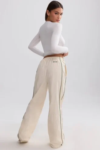 Pantalones de chándal de pierna ancha repelentes al agua en color mármol