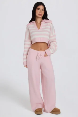 Pantalones de chándal de punto de talle medio y pierna ancha en rosa suave
