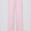 Pantalones de chándal de punto de talle medio y pierna ancha en rosa suave