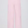 Pantalones de chándal de punto de talle medio y pierna ancha en rosa suave