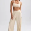 Pantalones de chándal de rizo de pierna ancha en color crema