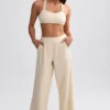 Pantalones de chándal de rizo de pierna ancha en color crema