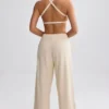 Pantalones de chándal de rizo de pierna ancha en color crema