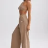 Pantalones de chándal de rizo de pierna ancha en marrón moca