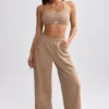 Pantalones de chándal de rizo de pierna ancha en marrón moca