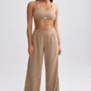 Pantalones de chándal de rizo de pierna ancha en marrón moca
