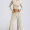 Pantalones de chándal de talle bajo y pierna ancha en color hueso