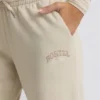 Pantalones de chándal de talle bajo y pierna ancha en color hueso