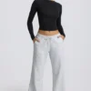 Pantalones de chándal de talle bajo y pierna ancha en gris jaspeado