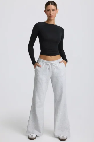 Pantalones de chándal de talle bajo y pierna ancha en gris jaspeado