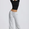 Pantalones de chándal de talle bajo y pierna ancha en gris jaspeado