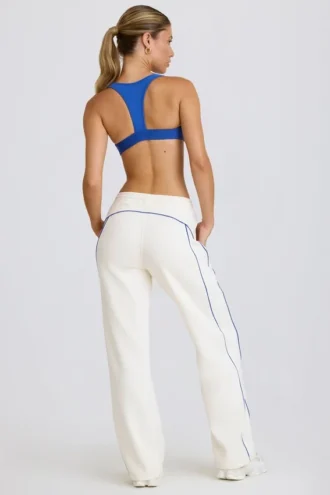 Pantalones de chándal de talle medio y corte recto en blanco