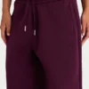 Pantalones de chándal holgados de tiro medio de jersey de algodón cepillado en color burdeos