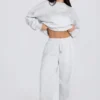 Pantalones de chándal holgados de tiro medio de jersey de algodón cepillado en gris jaspeado