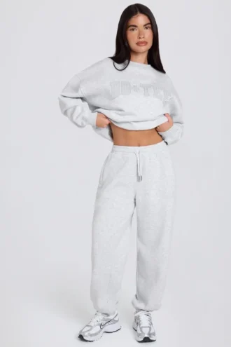 Pantalones de chándal holgados de tiro medio de jersey de algodón cepillado en gris jaspeado