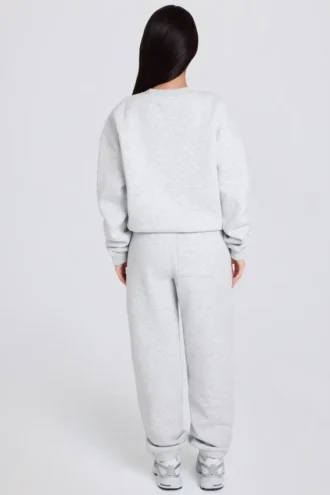 Pantalones de chándal holgados de tiro medio de jersey de algodón cepillado en gris jaspeado