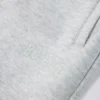 Pantalones de chándal holgados de tiro medio de jersey de algodón cepillado en gris jaspeado