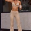 Pantalones de cintura alta con doble vuelta en punto elástico suave en color beige arena