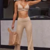 Pantalones de cintura alta con doble vuelta en punto elástico suave en color beige arena