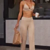 Pantalones de cintura alta con doble vuelta en punto elástico suave en color beige arena