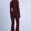 Pantalones de esquí impermeables con cinturón en color burdeos