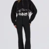 Pantalones de esquí impermeables de talle alto con tirantes en negro