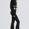 Pantalones de esquí impermeables de talle alto con tirantes en negro