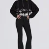 Pantalones de esquí impermeables de talle alto con tirantes en negro