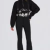 Pantalones de esquí impermeables de talle alto con tirantes en negro