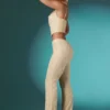 Pantalones de talle bajo con encaje adornado Fallon Petite en color marfil