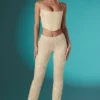 Pantalones de talle bajo con encaje adornado Fallon Petite en color marfil