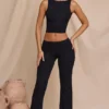 Pantalones rectos de talle medio Hollis en negro