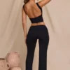 Pantalones rectos de talle medio Hollis en negro