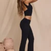 Pantalones rectos de talle medio Hollis en negro