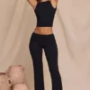 Pantalones rectos de talle medio Hollis en negro