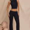 Pantalones rectos de talle medio Hollis en negro
