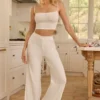 Pantalones rectos de talle medio Libby Pointelle en blanco