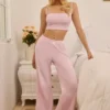 Pantalones rectos de talle medio Libby Pointelle en rosa bebé
