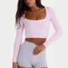 Partes de arriba asimétricas sin costuras de punto elástico suave en rosa empolvado