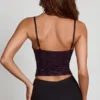 Partes de arriba con cuello vuelto y aberturas decoradas Armelia en serpiente morada