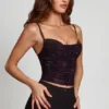 Partes de arriba con cuello vuelto y aberturas decoradas Armelia en serpiente morada