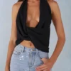 Partes de arriba con escote profundo y cuello halter Maraya en negro