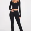 Pantalones acampanados de talle medio Philippa Modal en negro