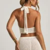 Partes de arriba cortas con cuello halter Gianna en bouclé blanco