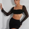 Partes de arriba cortas con cuello vuelto y adornos La Desirade en negro