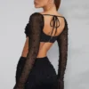 Partes de arriba cortas con cuello vuelto y adornos La Desirade en negro